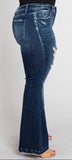 Distressed, mid rise, dark wash flared jeans