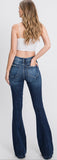 Distressed, mid rise, dark wash flared jeans